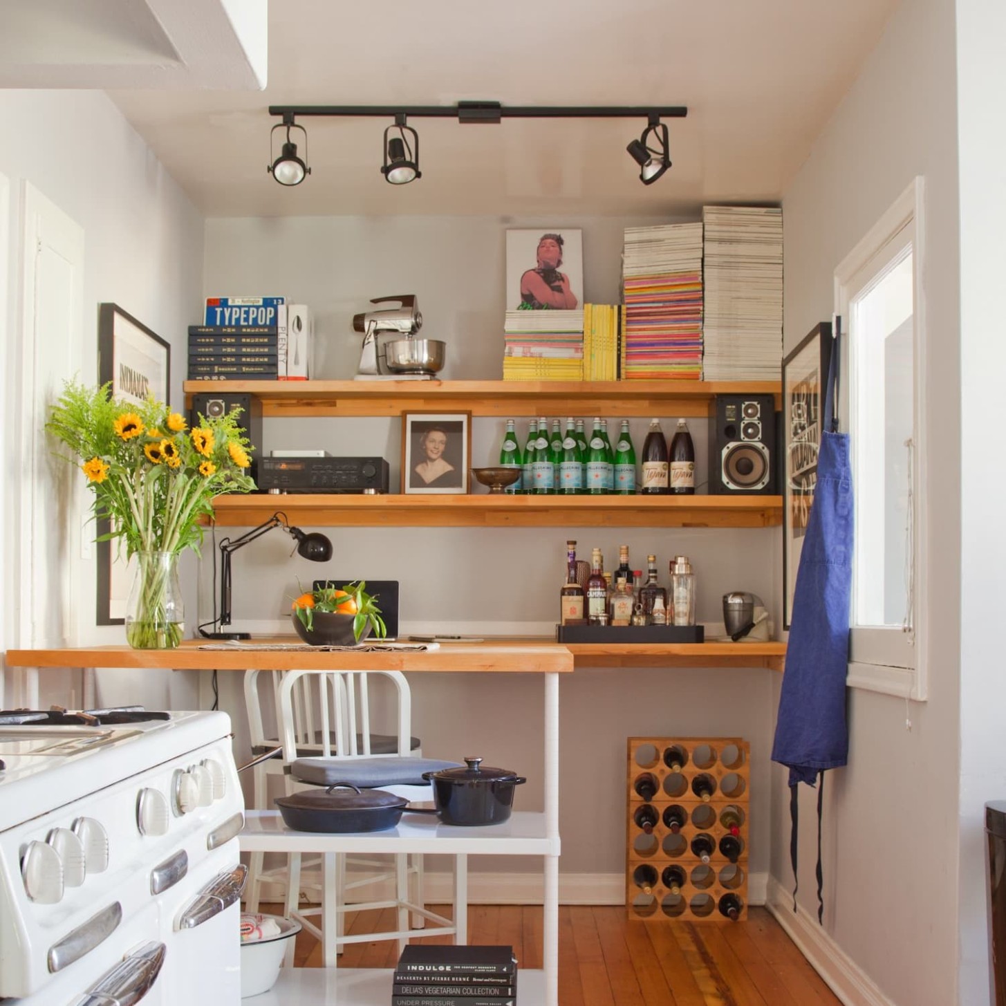 10 Ways to Make a Small Kitchen Look Infinitely Bigger  Apartment  - how do you make a small kitchen look bigger?